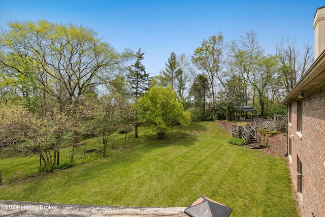 view of yard with a deck