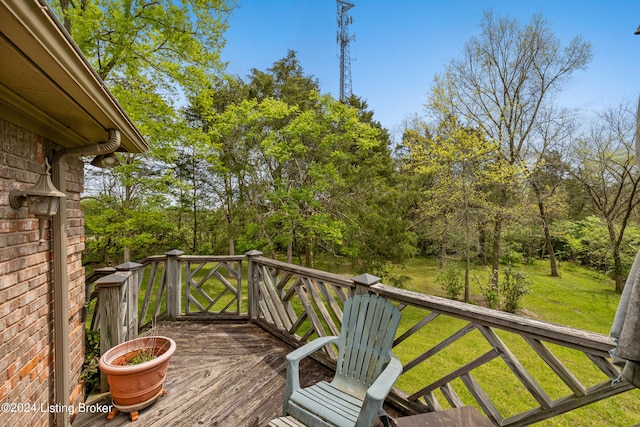 deck featuring a lawn