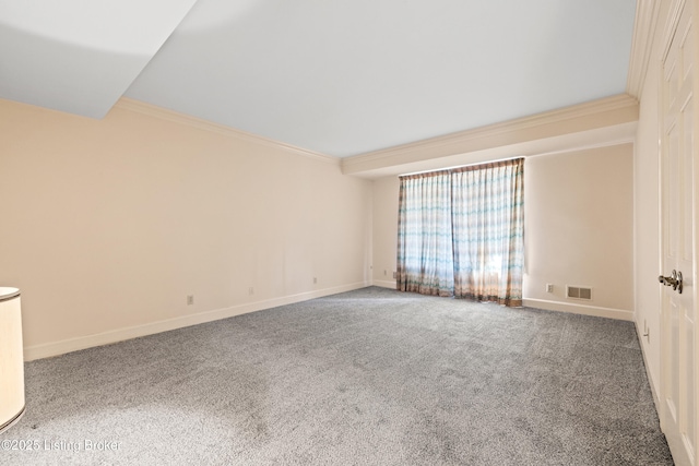 carpeted empty room featuring crown molding