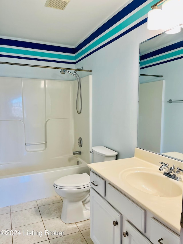 full bathroom with vanity, tile patterned floors, toilet, and shower / bath combination