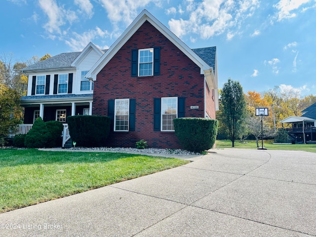 view of front property with a front yard