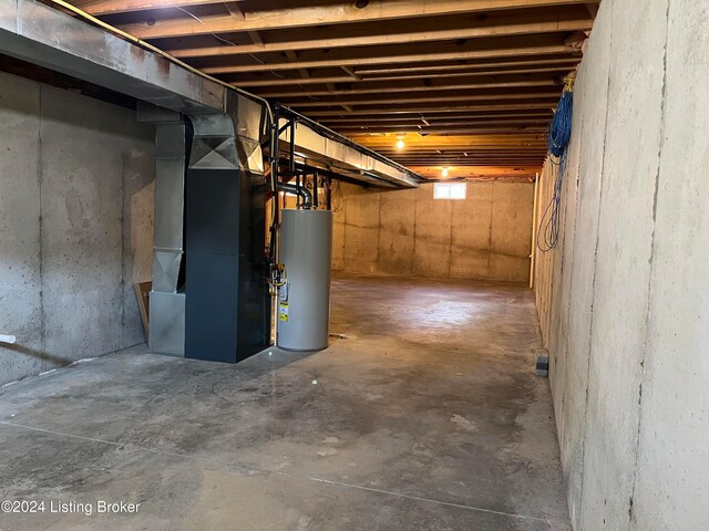 basement with heating unit and gas water heater