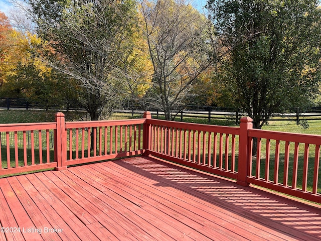 deck featuring a yard