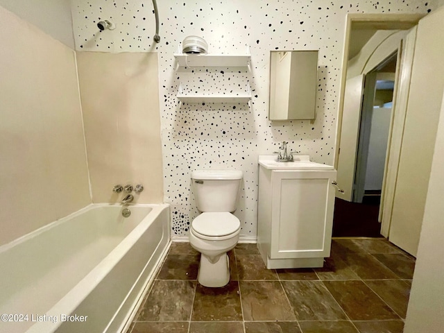 full bathroom featuring tile patterned flooring, vanity, toilet, and  shower combination