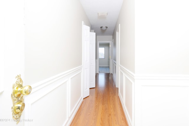 hallway featuring light hardwood / wood-style floors