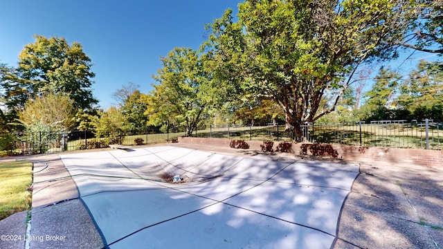 view of pool with fence