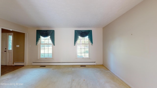 doorway to outside featuring carpet flooring and a baseboard radiator