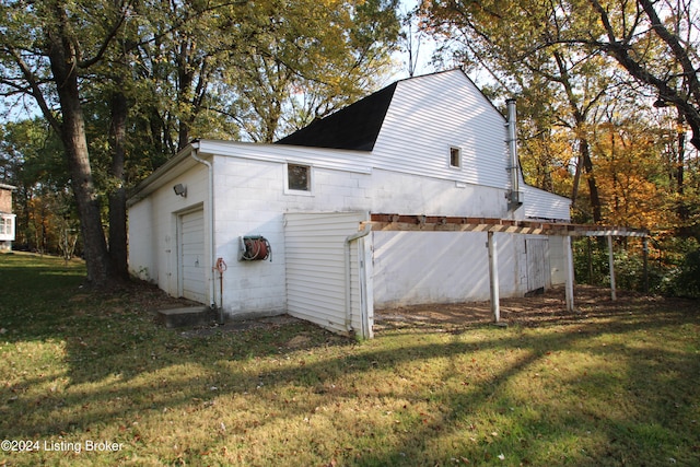 view of outbuilding featuring a garage