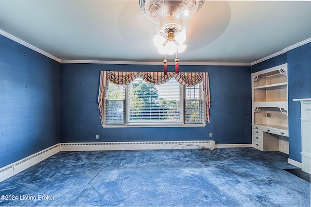 empty room featuring dark carpet, ornamental molding, baseboard heating, and built in desk