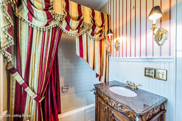 bathroom with vanity and shower / bath combo