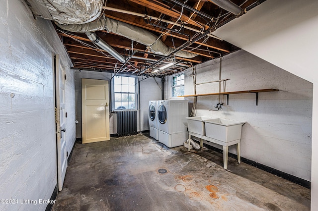 basement with washing machine and dryer