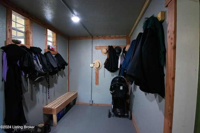 mudroom with concrete floors