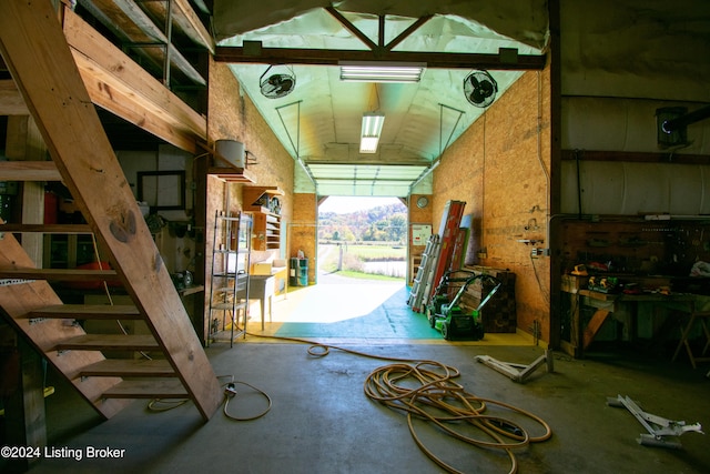 garage with a workshop area