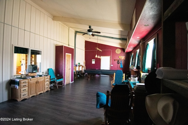 interior space featuring ceiling fan, vaulted ceiling with beams, and dark hardwood / wood-style flooring