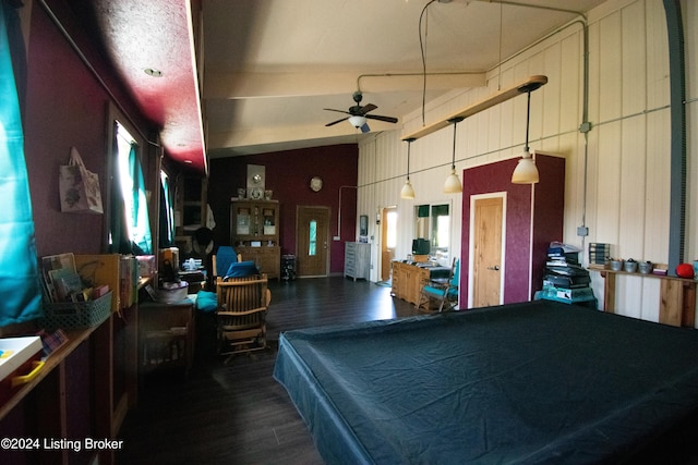 game room with wooden walls, billiards, dark wood-type flooring, and ceiling fan