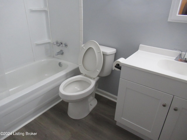 full bathroom with vanity, shower / tub combination, hardwood / wood-style flooring, and toilet