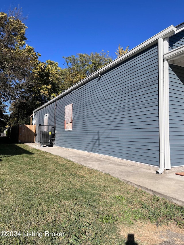 view of home's exterior featuring a lawn