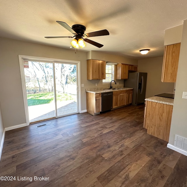 kitchen with dishwasher, sink, dark hardwood / wood-style flooring, and stainless steel fridge with ice dispenser