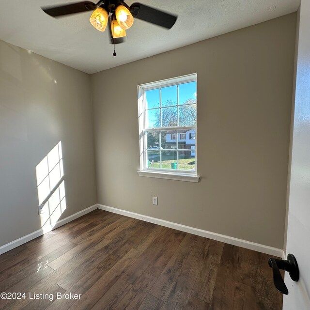 744 Brian Ct, Radcliff, KY 40160 - empty room with wood finished floors, baseboards, and ceiling fan