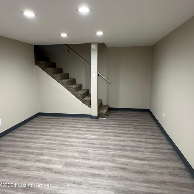 basement featuring light hardwood / wood-style flooring