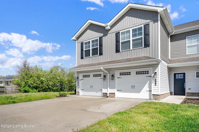 view of front of property featuring a garage