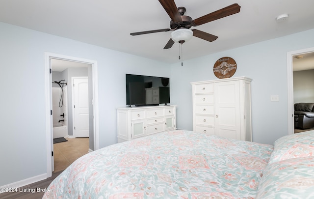 bedroom with ceiling fan and light wood-type flooring