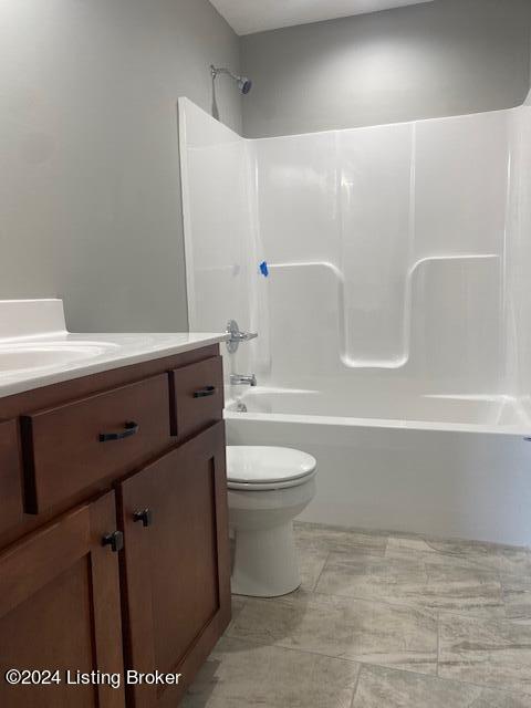 full bathroom with toilet, shower / washtub combination, and vanity