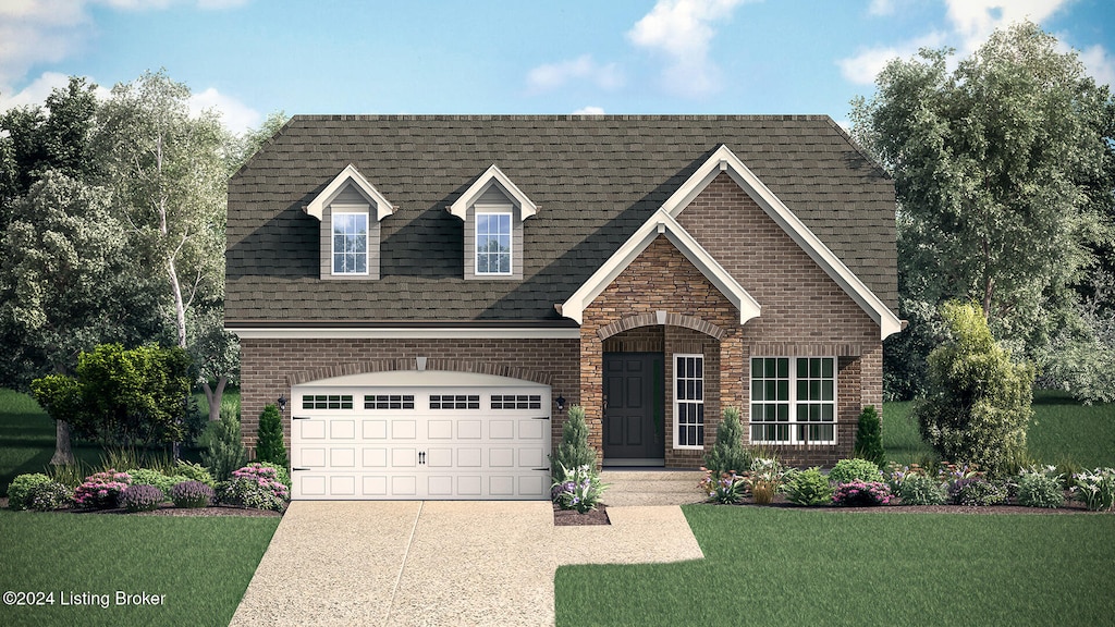 view of front facade with a front yard and a garage