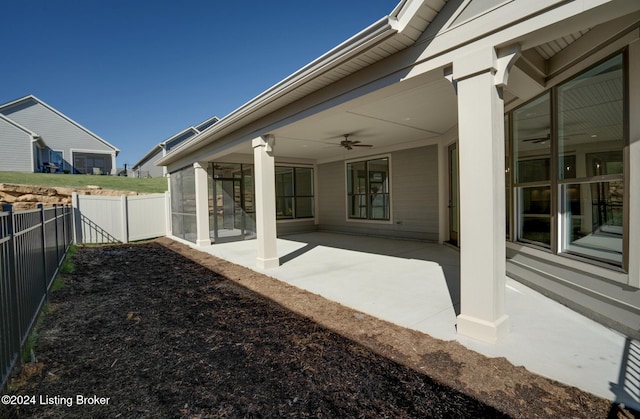 view of yard featuring a patio and ceiling fan