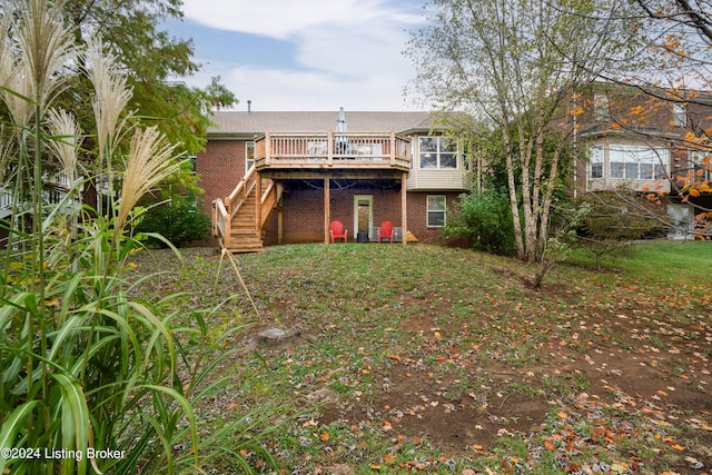 back of property featuring a deck