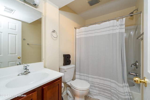 bathroom featuring toilet, a shower with curtain, and vanity