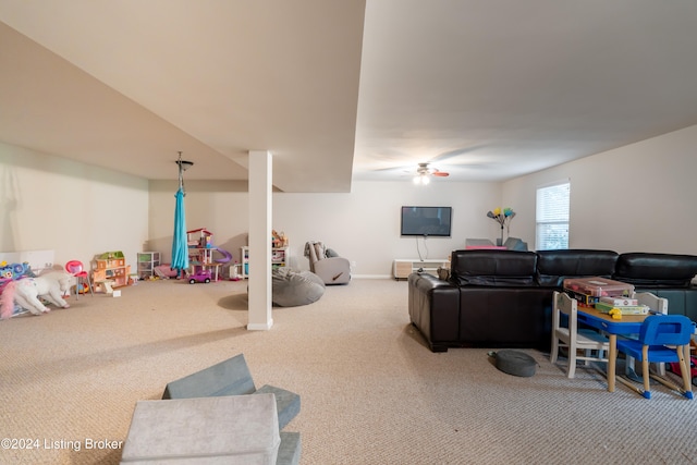 living room with carpet floors and ceiling fan