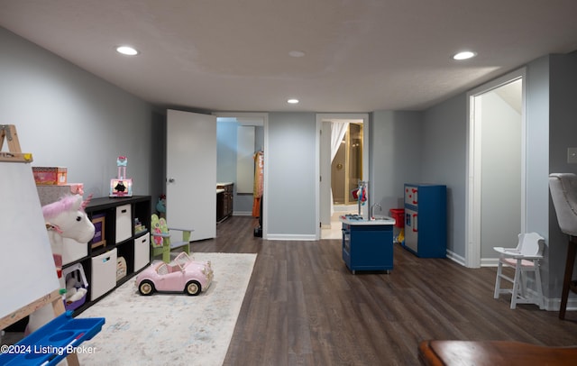 game room featuring dark hardwood / wood-style flooring