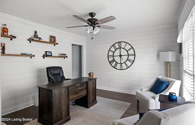 office with crown molding, ceiling fan, and dark hardwood / wood-style flooring