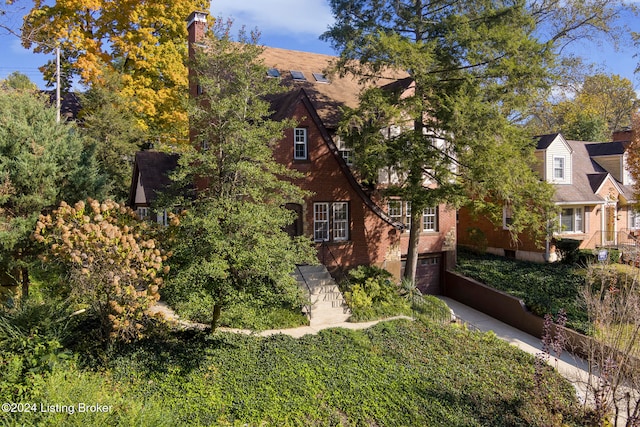 tudor home with a garage