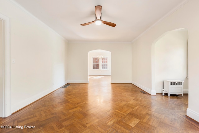 unfurnished room with parquet floors, crown molding, radiator heating unit, and ceiling fan with notable chandelier