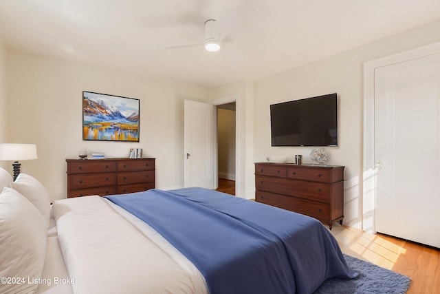 bedroom featuring ceiling fan and light hardwood / wood-style flooring