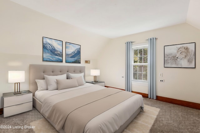 carpeted bedroom with lofted ceiling