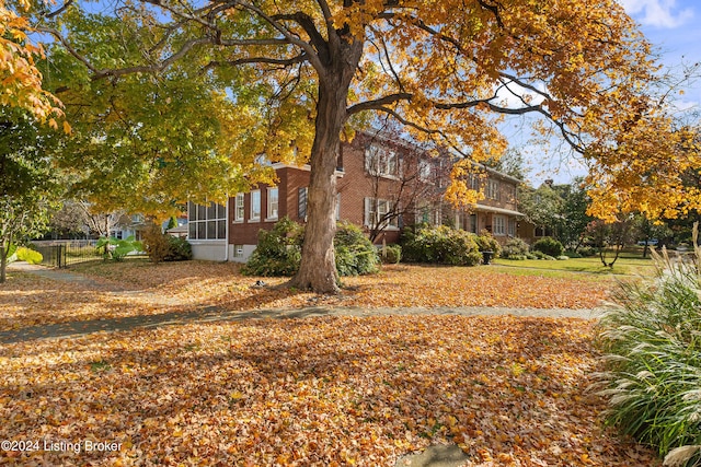 view of yard with a sunroom