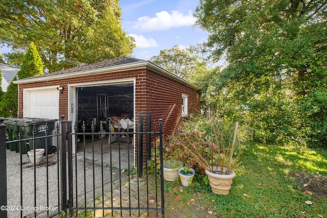 view of outbuilding with a garage