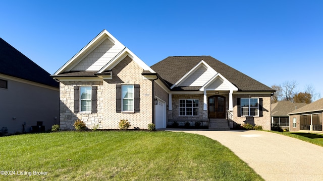 craftsman-style home with a front yard and cooling unit