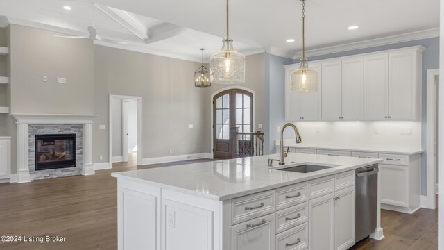 kitchen with white cabinetry, dishwasher, sink, dark wood-type flooring, and a center island with sink