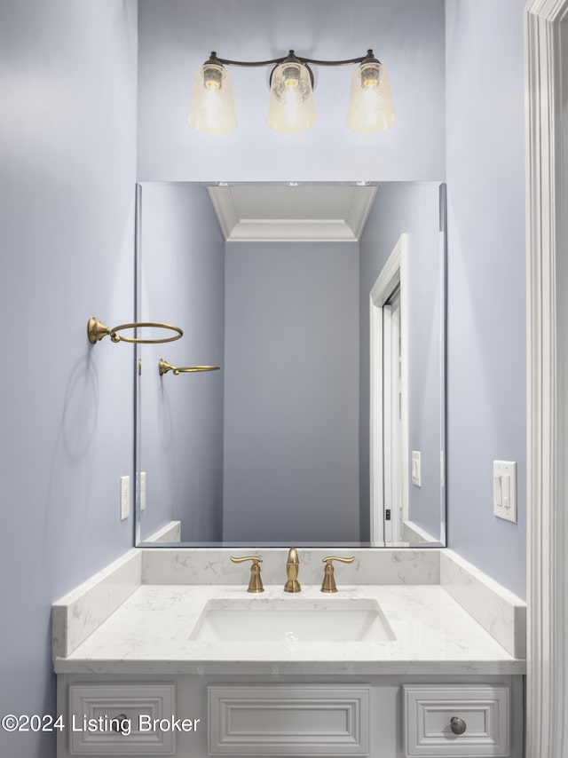 bathroom featuring vanity and crown molding