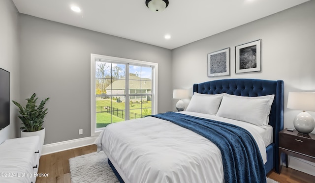 bedroom featuring dark wood-type flooring