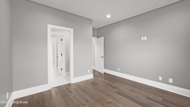 empty room featuring hardwood / wood-style floors