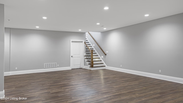 basement with dark wood-type flooring