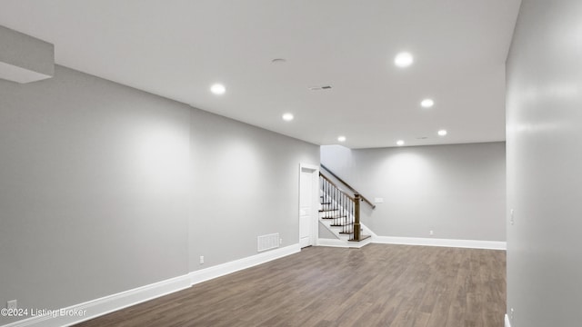 basement with wood-type flooring