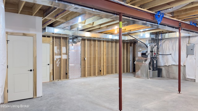 basement featuring heating unit