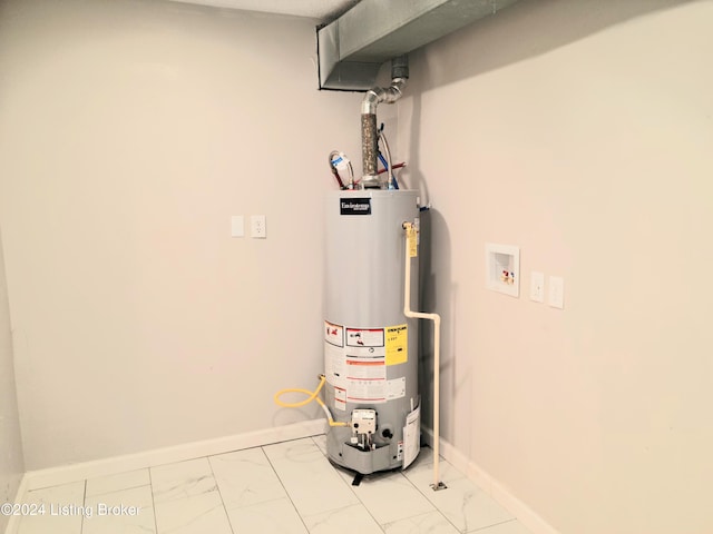 utility room with gas water heater