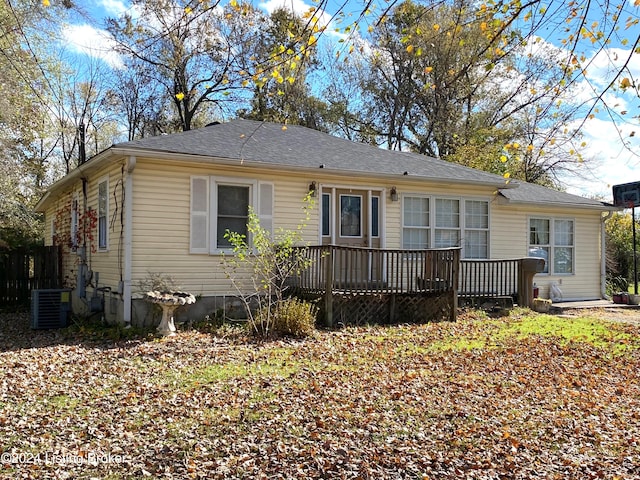 back of property with central air condition unit and a wooden deck